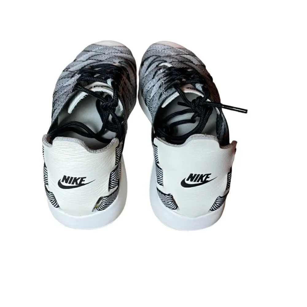 NIKE WOMEN WOMEN'S NIKE JUVENATE WOVEN PREMIUM.